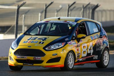 Fritz Wilke in the #84 Fritz Wilke Racing B-Spec Ford Fiesta at Sonoma Raceway in Sonoma California.  Photo taken at Turn 10 during the 2018 SCCA National Runoffs.
