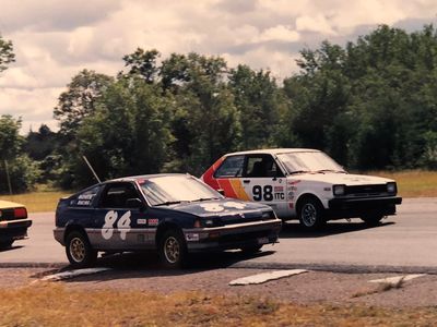 Fritz Wilke on the inside of Turn 3 in the #84 ITB Honda CRX at Brainerd International Raceway in Brainerd Minnesota.