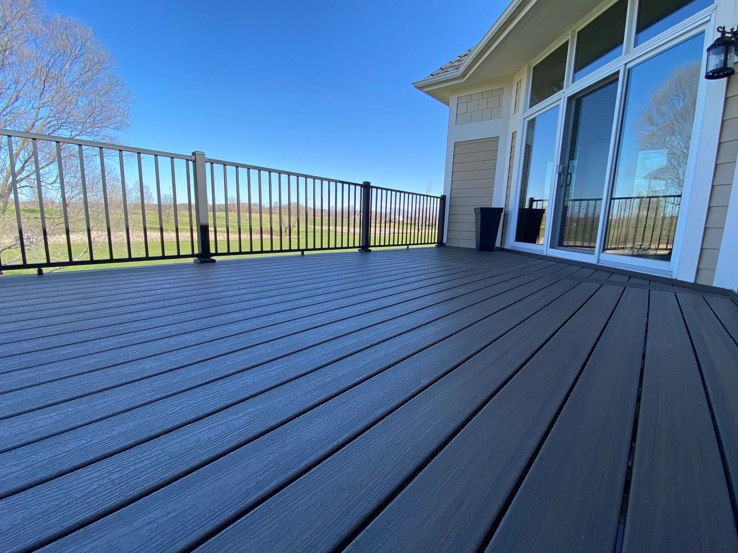 Newly resurfaced deck overlooking the golf coarse.