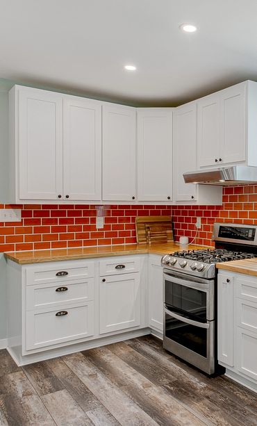 Classic knobs and pulls in this trendy kitchen.