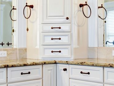 Traditional-looking bathroom with antiqued hardware.