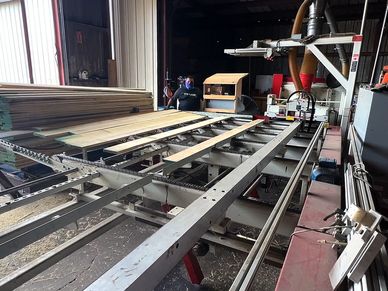 Our laser-guided rip saw operated by one of our skilled manufacturing employees in Donna, TX.
