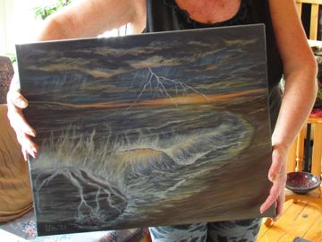 Wendi Fox with one of her paintings