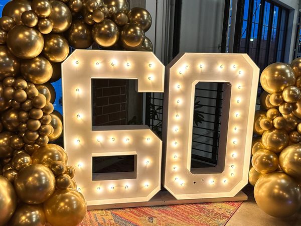 4 foot tall marquee number rentals and balloon garland party decor rentals Charlotte, NC