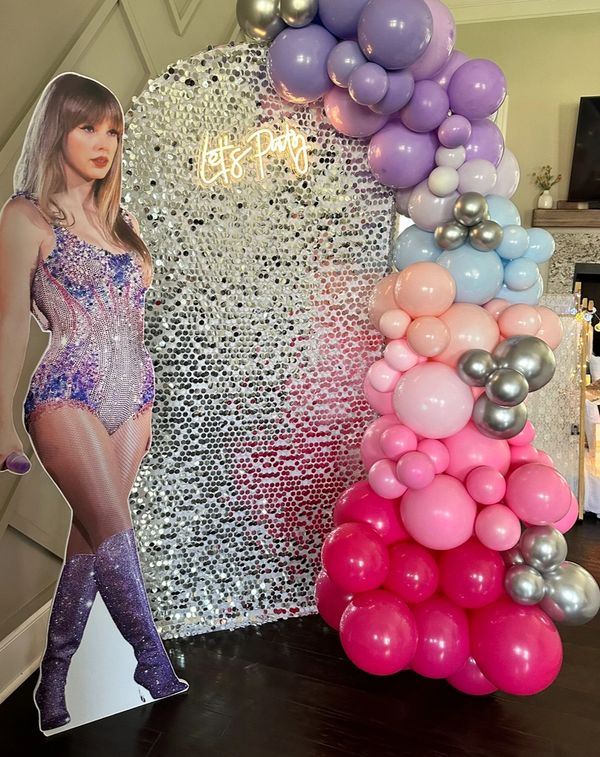 Taylor Swift cut out rental and shimmer photo backdrop rental with balloons