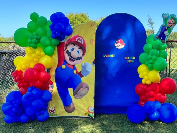 Super Mario kids party backdrops with balloon garlands in Charlotte, NC