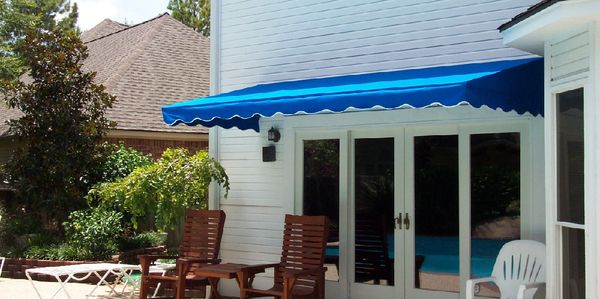 Pacific blue Sunbrella canvas 4601 French door awning with white trim valance 