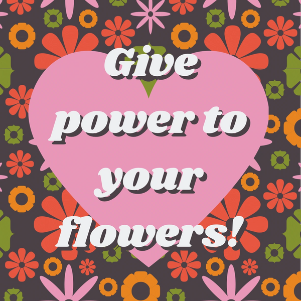 Give power to your flowers written on a floral background