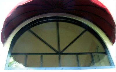 Evolution hurricane shutters are custom made to preserve the architectural design of your home.