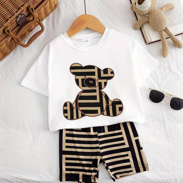 Children's outfit with a teddy bear print and matching patterned shorts.