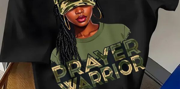 Black T-shirt with a camo-themed 'Prayer Warrior' design featuring a woman in a cap.
