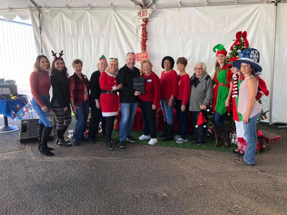 Charity Christmas party for Pinal County foster kids and kinship families.