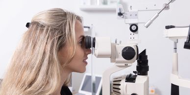 eye doctor performing an eye exam