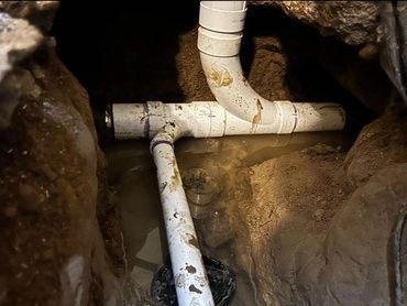 Plumbing underground and concrete slab. Replace cast iron drains with pvc