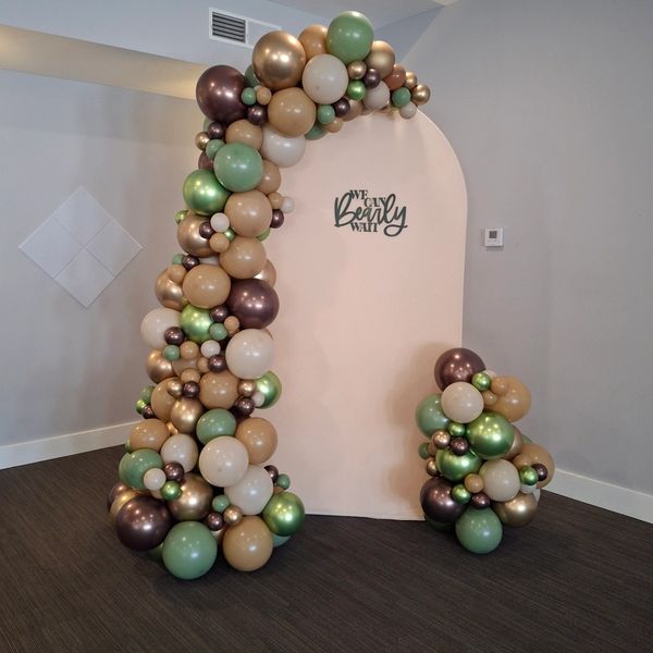 Arched Wall panel with organic garland and cluster. With sign