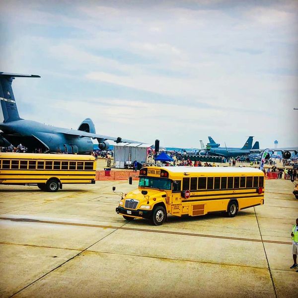 Buses shuttling passengers at air show