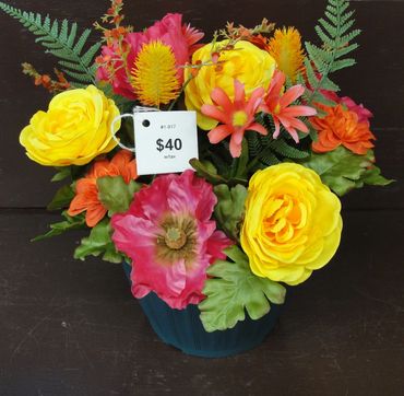 9" Green Pot with Yellow Ranunculus, Pink Poppies & Orange Zinnias