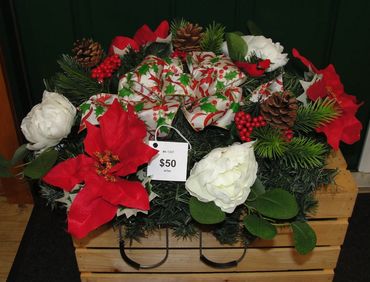 Galvanized Wire Saddle with Holly & Red Ribbon Bow, Red Poinsettias, Cream Peonies, Pinecones, Berri