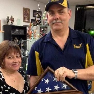 DJ and Judi Brown, owners of Tacoma Trophy in Lakewood, Washington