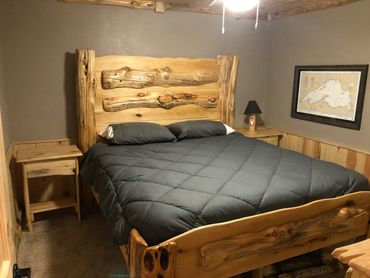 Master bedroom with a king bed