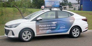 midia DOOOH publicidade em carros de aplicativos nas 27 capitais , uber taxidoormidia com led