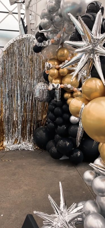 new years party decorations and balloon arch