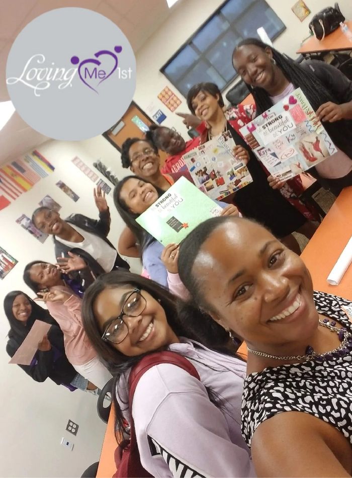Kama and the mentees at girl's club on campus for vision board day!