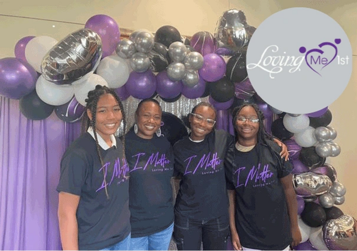All smiles at7th Annual girl's 'I Matter!' Conference with founder Kama and program participants