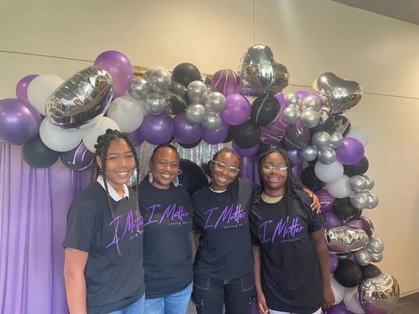 Founder Kama and mentorship program participants at 7th annual Girl’s 'I Matter!' Conference