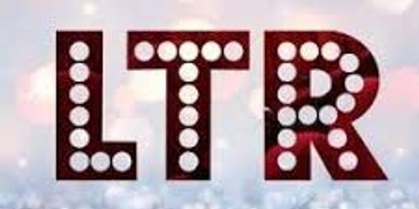 Bold letters LTR with circular light bulbs on a soft background.