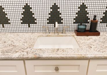 Bathroom backsplash of pine tree mosaic tiles
