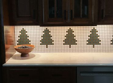 Kitchen backsplash of pine tree mosaic tiles