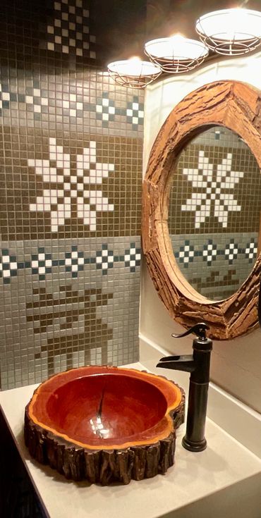 Mosaic mural with Nordic patterns in bathroom