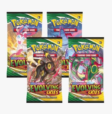 Four Pokémon Sword & Shield Evolving Skies booster packs with different featured Pokémon.
