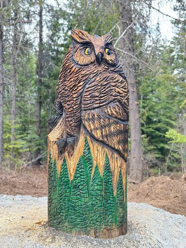 Large owl carving by Aaron Chavez