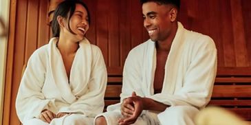 Couple enjoying a sauna session together.