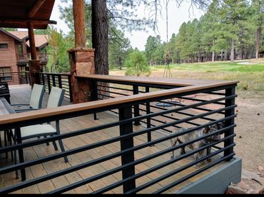 Modern horizontal steel deck railing with wood top rail, Flagstaff AZ