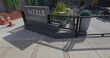 Custom iron patio railing for outdoor restaurant seating in Peoria, Arizona.