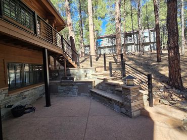 Custom iron deck railing and stair railing for mountain home.