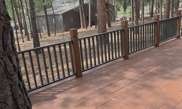 Custom steel deck railing with oversized pickets, 1½×2 top and bottom rails, Flagstaff AZ