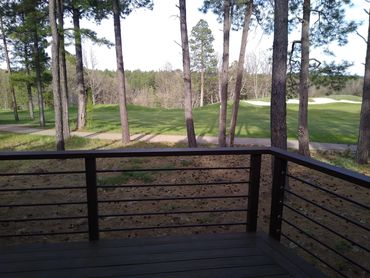 Custom steel deck railing with oversized cap rail and rust brown textured finish, BR-47