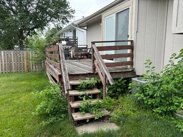 Before of very old back door deck