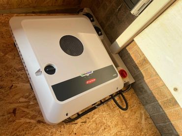 A solar inverter or PV inverter installed by Enietherm in Suffolk.