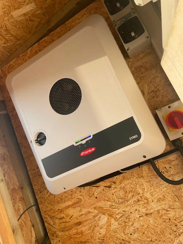 A solar inverter or PV inverter installed by Enietherm in Suffolk.