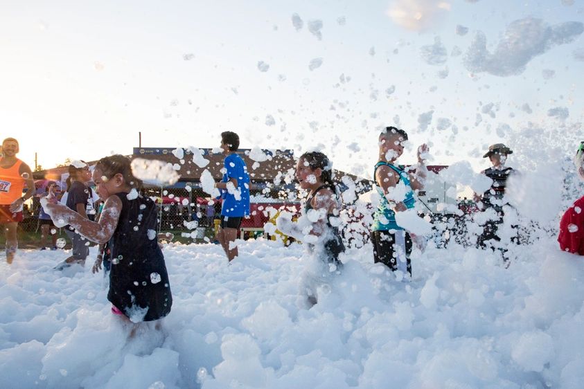 Kids having a blast at a Foam Run!
