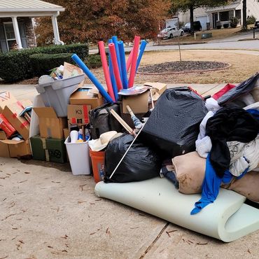 Before photo of a curbside junk removal.