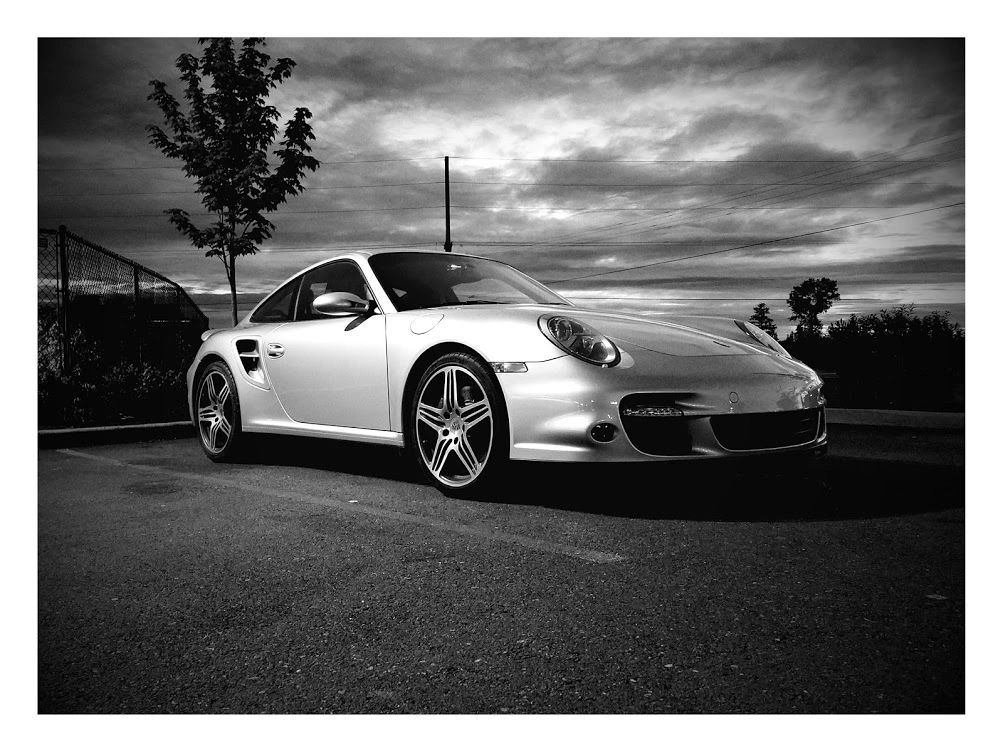 Black and white photo of Porsche.
