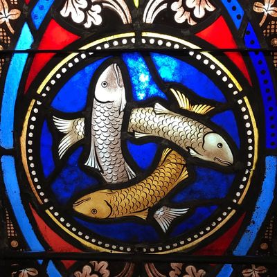 A "fishy" Trinity: A stained glass window at Trinity Cathedral