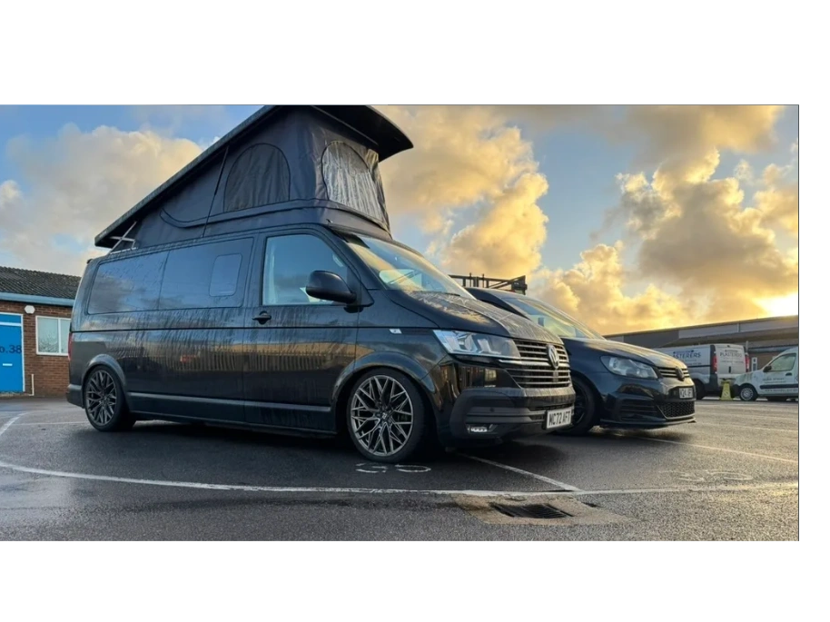 Black Volkswagen campervan with a raised Skyline pop-top roof at M-Craft