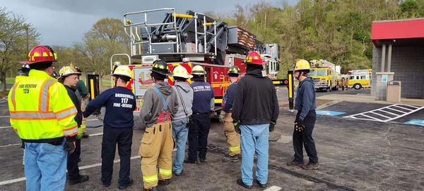 Captain Baselj with firefighters from the BVFD and other departments training on aerial operations.